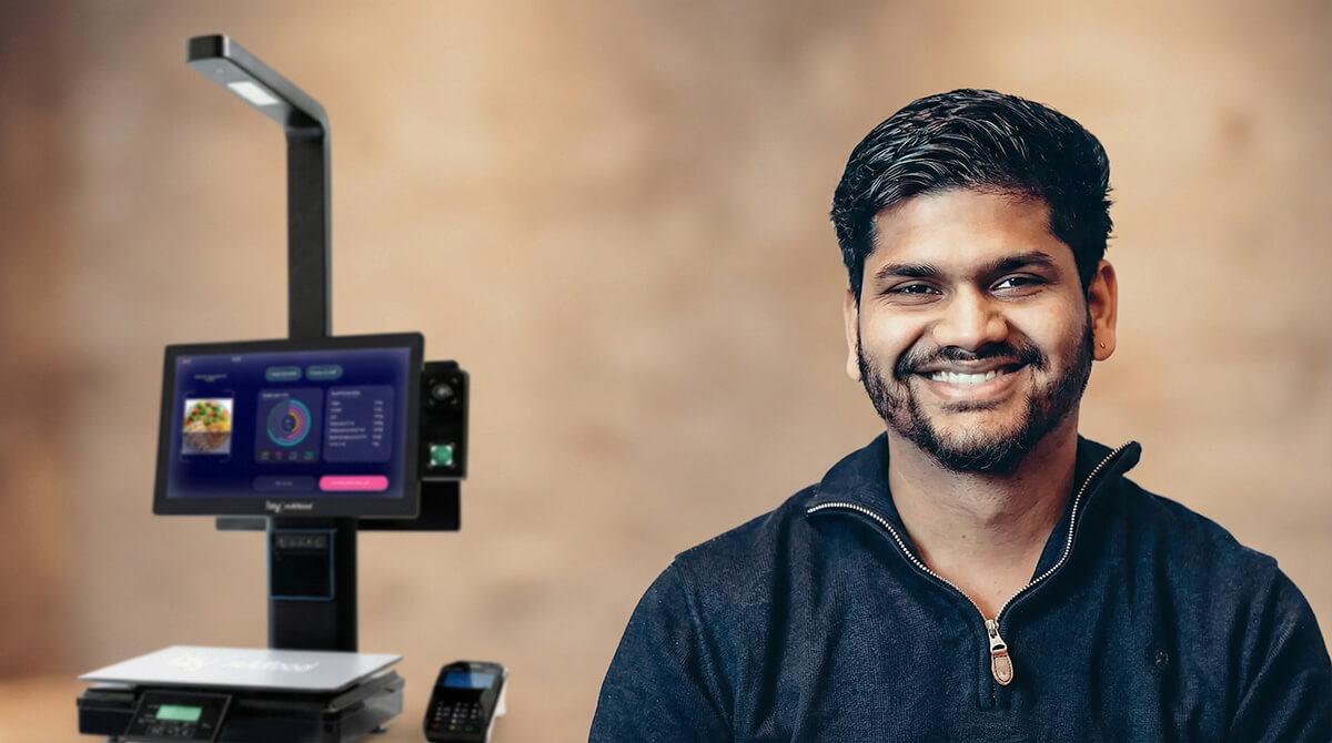 Saurav in front of the Izy mAIfood POS system